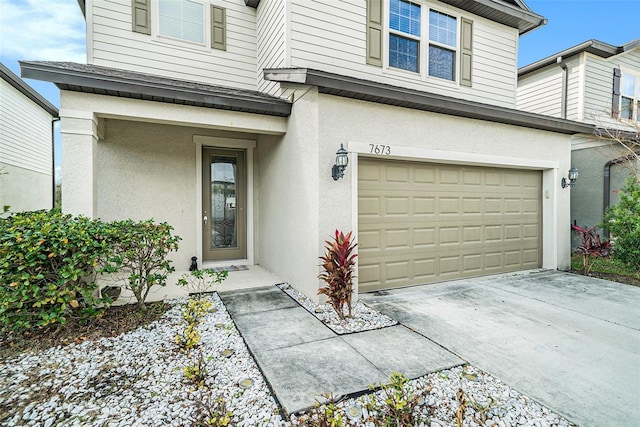 property entrance with a garage