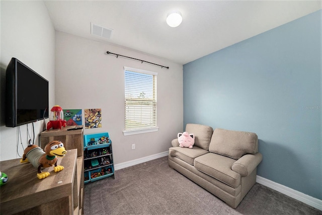 living area with carpet