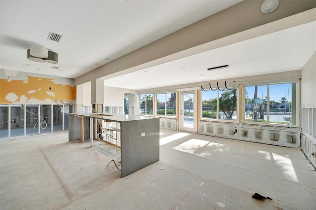 kitchen with pendant lighting and a breakfast bar area