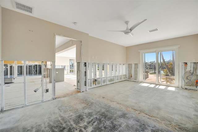 empty room with concrete flooring and ceiling fan