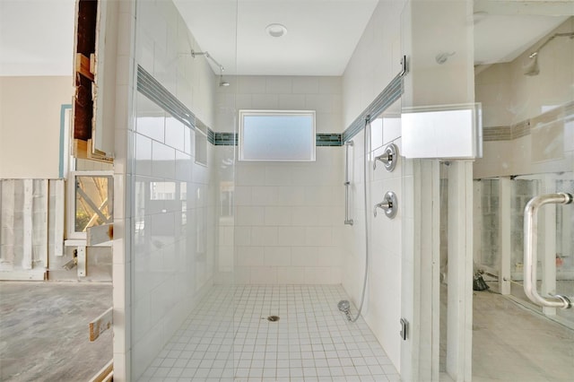 bathroom featuring an enclosed shower