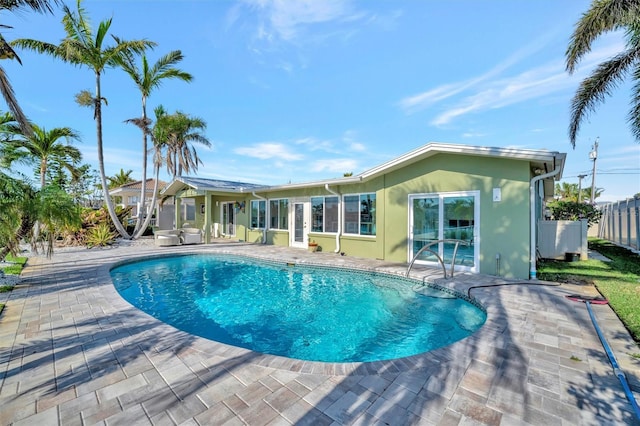 view of pool featuring a patio