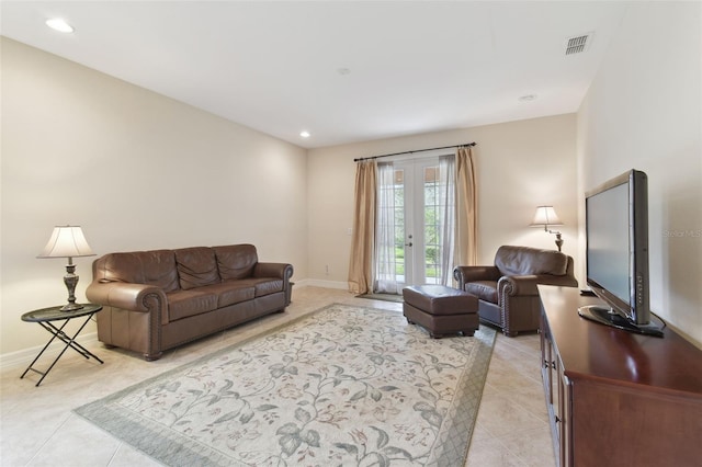 living room featuring light tile patterned floors, recessed lighting, visible vents, baseboards, and french doors