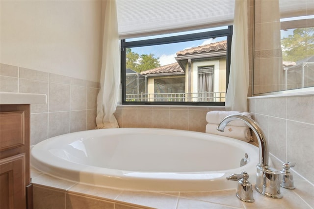 full bathroom with a garden tub