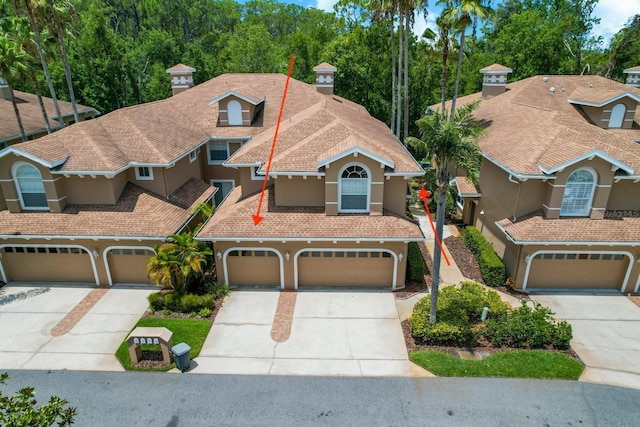 view of front of property featuring a garage