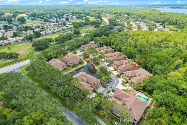 bird's eye view with a water view