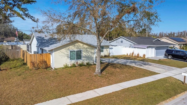 view of front of property with a front lawn