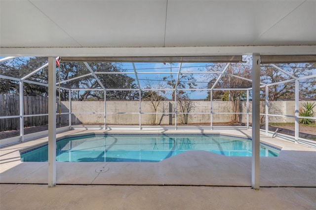 view of pool featuring a patio and a lanai