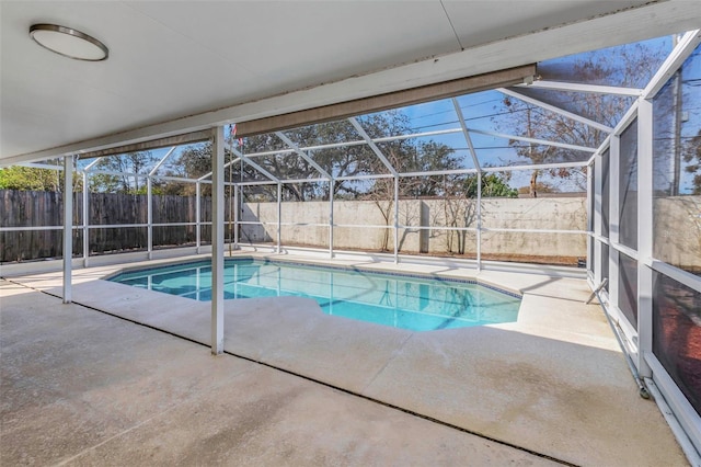 view of pool featuring a lanai and a patio area