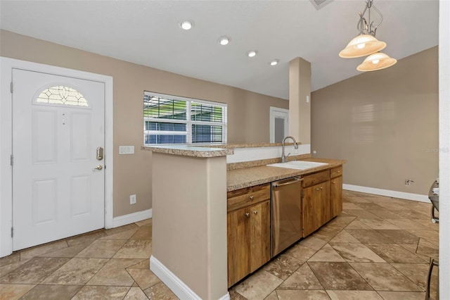 kitchen with lofted ceiling, sink, hanging light fixtures, a center island with sink, and dishwasher