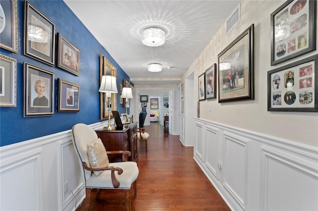 hall with dark hardwood / wood-style floors