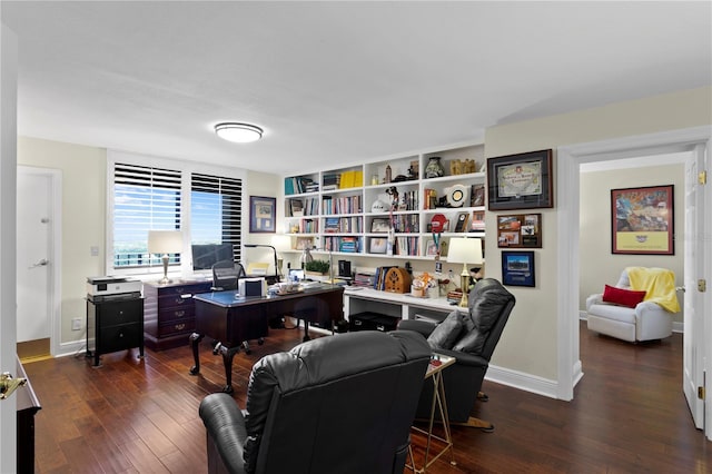 home office with dark hardwood / wood-style floors