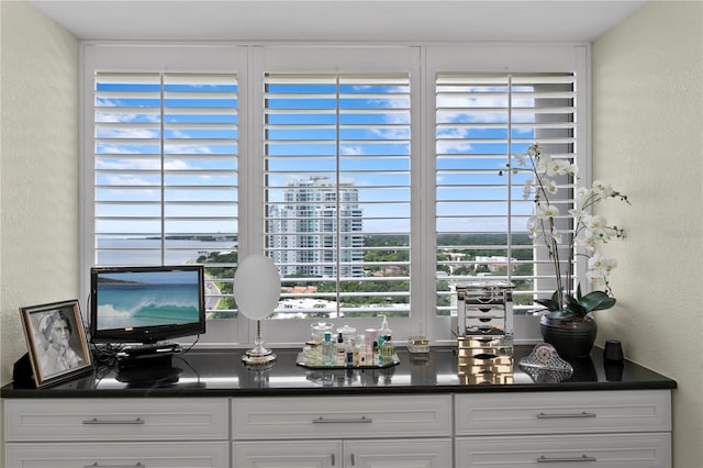 bar with white cabinetry