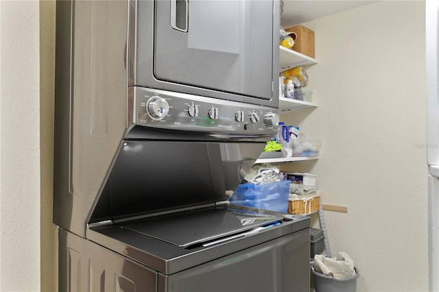 laundry room featuring stacked washer and dryer