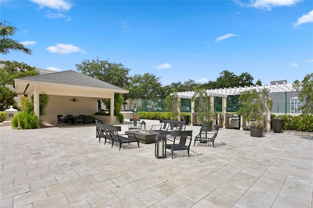 view of patio featuring a pergola and a gazebo