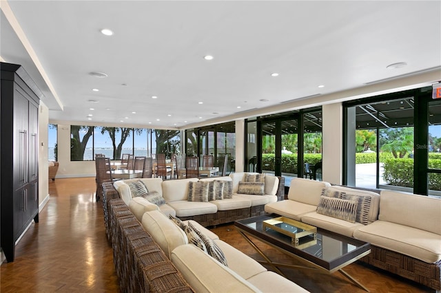 living room with dark parquet flooring