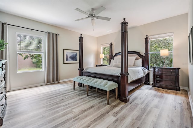 bedroom featuring ceiling fan and light hardwood / wood-style floors