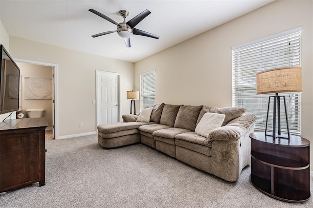 19308 Sunset Bay Dr, Land O Lakes, FL 34638 - carpeted living area with a ceiling fan, healthy amount of natural light, and baseboards