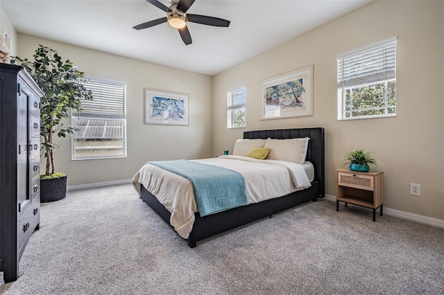 19308 Sunset Bay Dr, Land O Lakes, FL 34638 - carpeted bedroom with baseboards and a ceiling fan