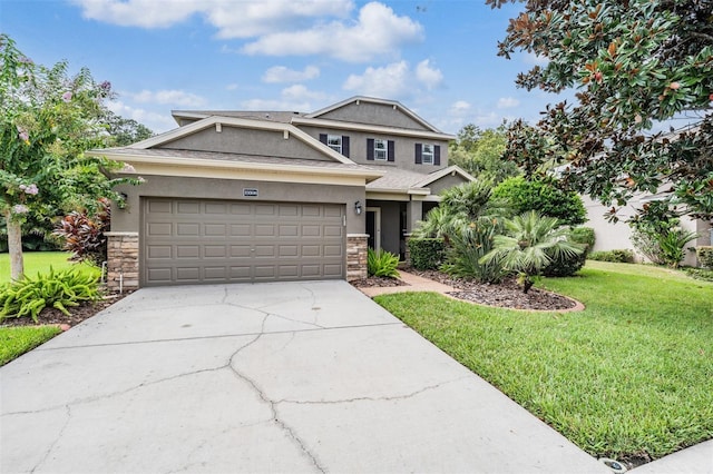 19308 Sunset Bay Dr, Land O Lakes, FL 34638 - view of front facade with stucco siding, a front lawn, driveway, and stone siding