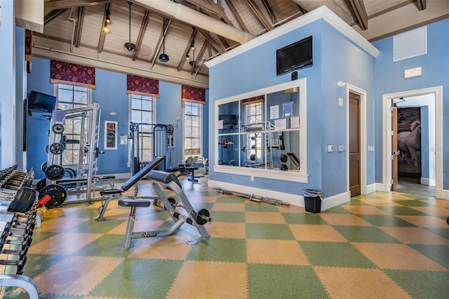 19308 Sunset Bay Dr, Land O Lakes, FL 34638 - workout area featuring high vaulted ceiling, baseboards, beam ceiling, tile patterned floors, and wood ceiling