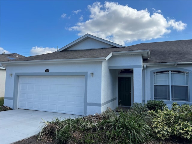 single story home with a garage