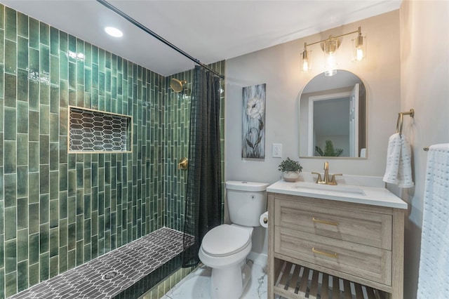 bathroom featuring vanity, a shower with curtain, and toilet