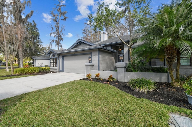 ranch-style house with a garage and a front lawn