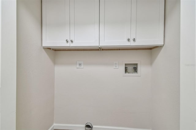 laundry room featuring cabinets, washer hookup, and hookup for an electric dryer