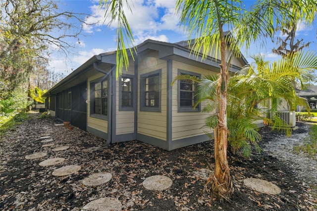 view of home's exterior featuring cooling unit