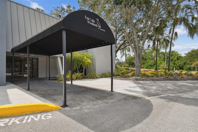 view of car parking with a carport