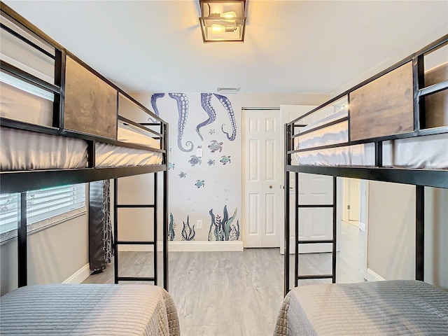 bedroom featuring light hardwood / wood-style floors