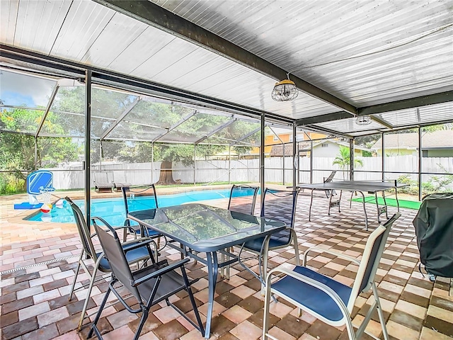 view of patio / terrace featuring a fenced in pool and a lanai