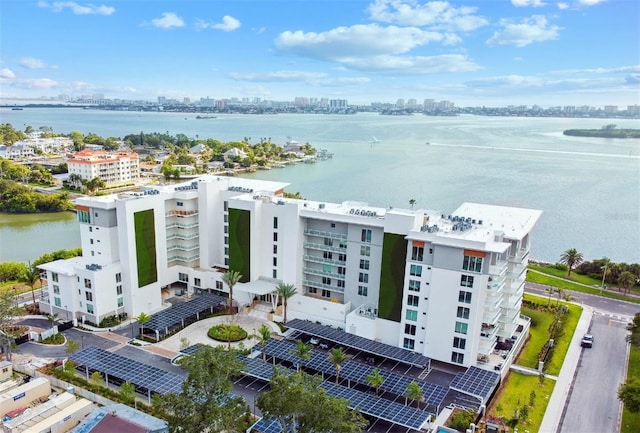 birds eye view of property featuring a water view