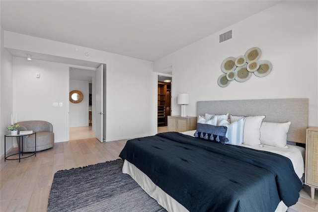 bedroom featuring wood-type flooring