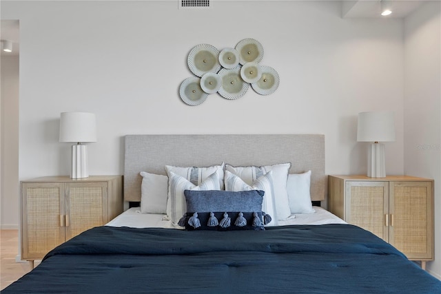 bedroom with light wood-type flooring