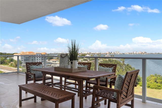 balcony featuring a water view