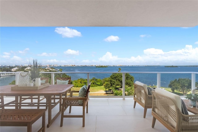 balcony featuring a water view