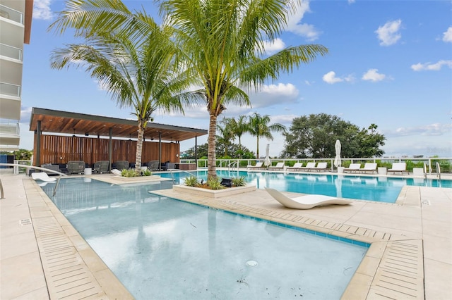 view of pool featuring a patio area