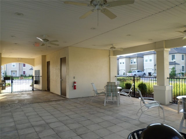 view of patio featuring ceiling fan