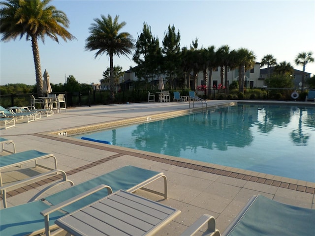 view of swimming pool featuring a patio