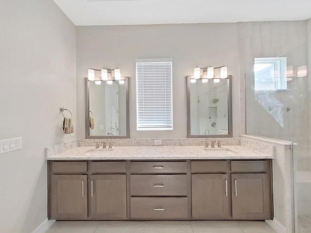 bathroom with vanity and a shower with shower door