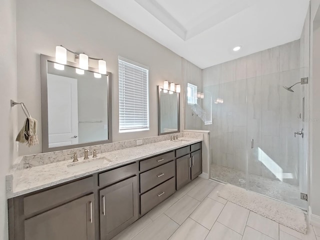 bathroom with vanity and an enclosed shower