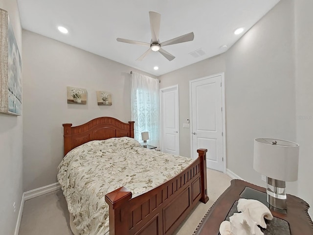 carpeted bedroom with ceiling fan