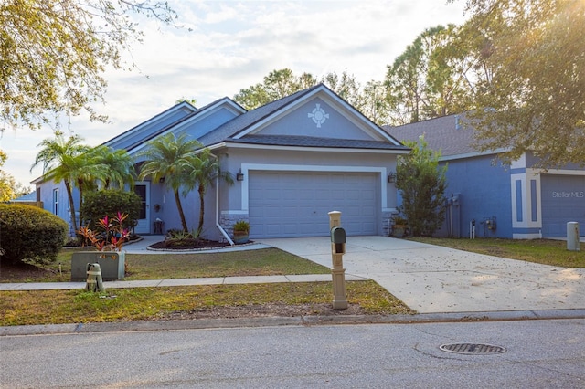 single story home with a garage