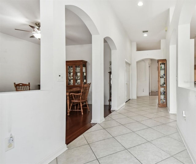 hallway with light tile patterned floors