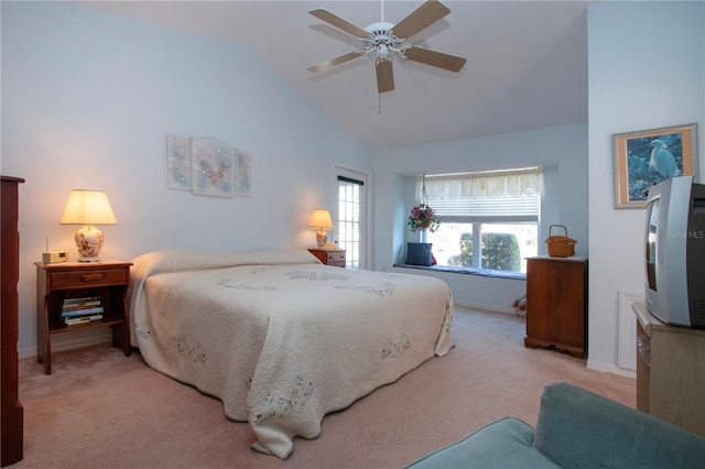 bedroom with high vaulted ceiling, light colored carpet, and ceiling fan