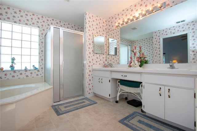 bathroom featuring vanity and plus walk in shower