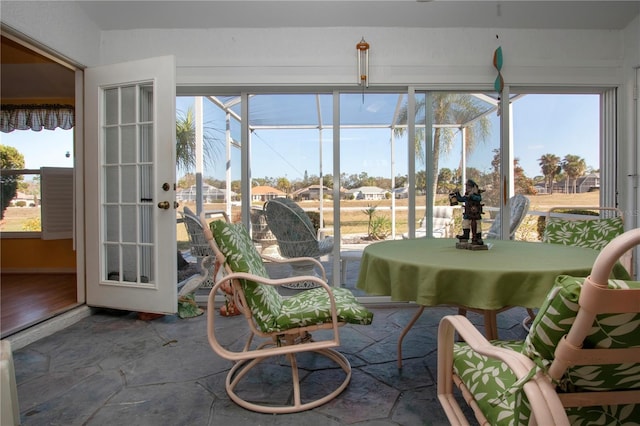 sunroom featuring a wealth of natural light