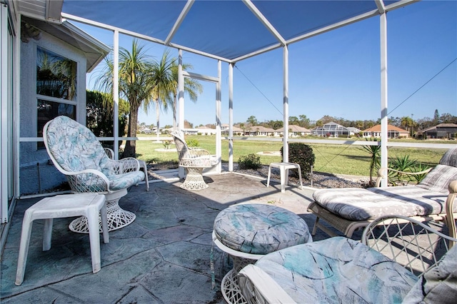 view of patio with a lanai